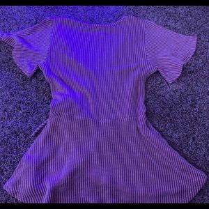 Women’s wrap- around blouse.